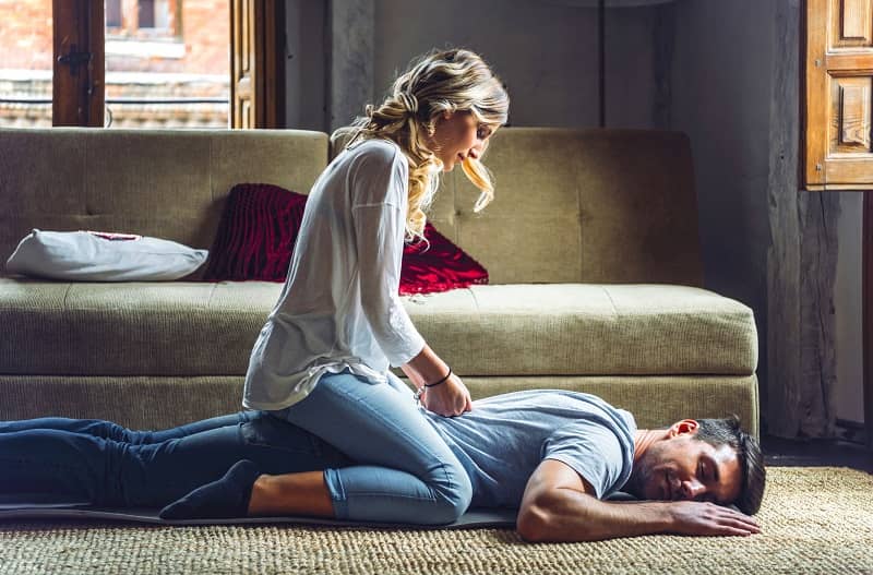 woman-massaging-boyfriend